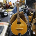 Early 20th century Ukulele in bag. Not available for in-house P&P