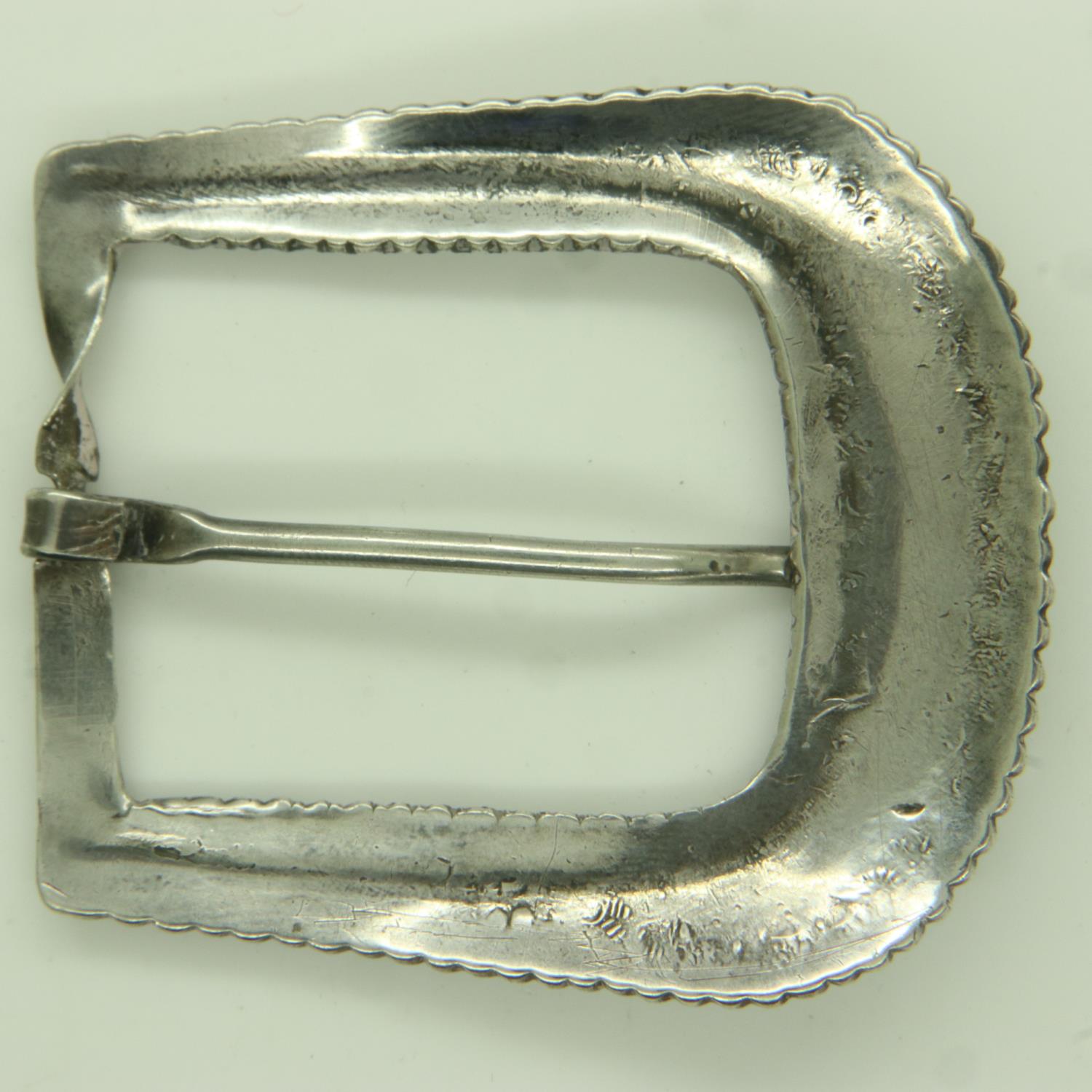 A South American white metal belt buckle, decorated in relief and set with nine graduating - Bild 2 aus 2