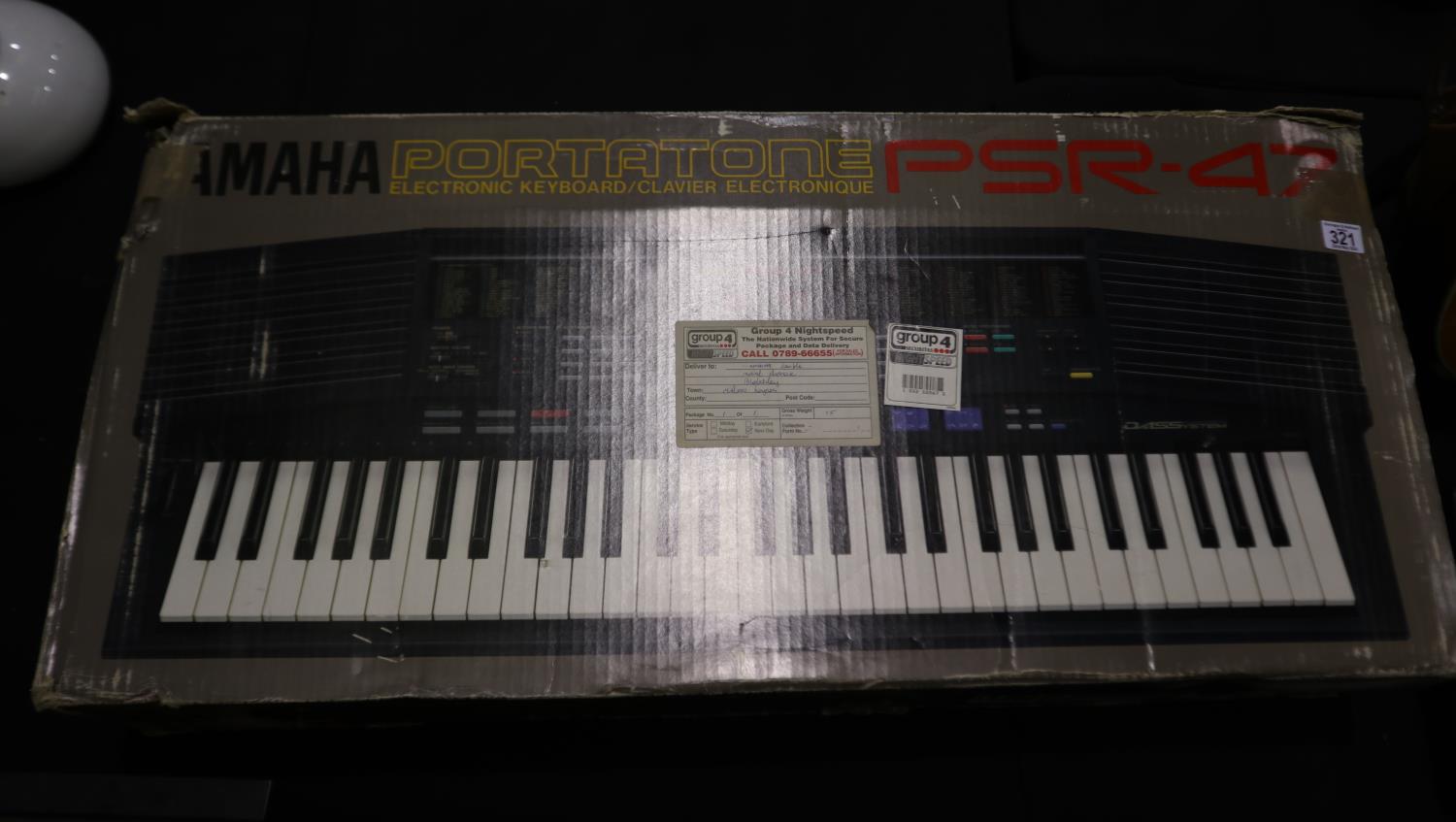 Yamaha Portatone electronic keyboard, boxed. All electrical items in this lot have been PAT tested