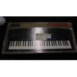 Yamaha Portatone electronic keyboard, boxed. All electrical items in this lot have been PAT tested