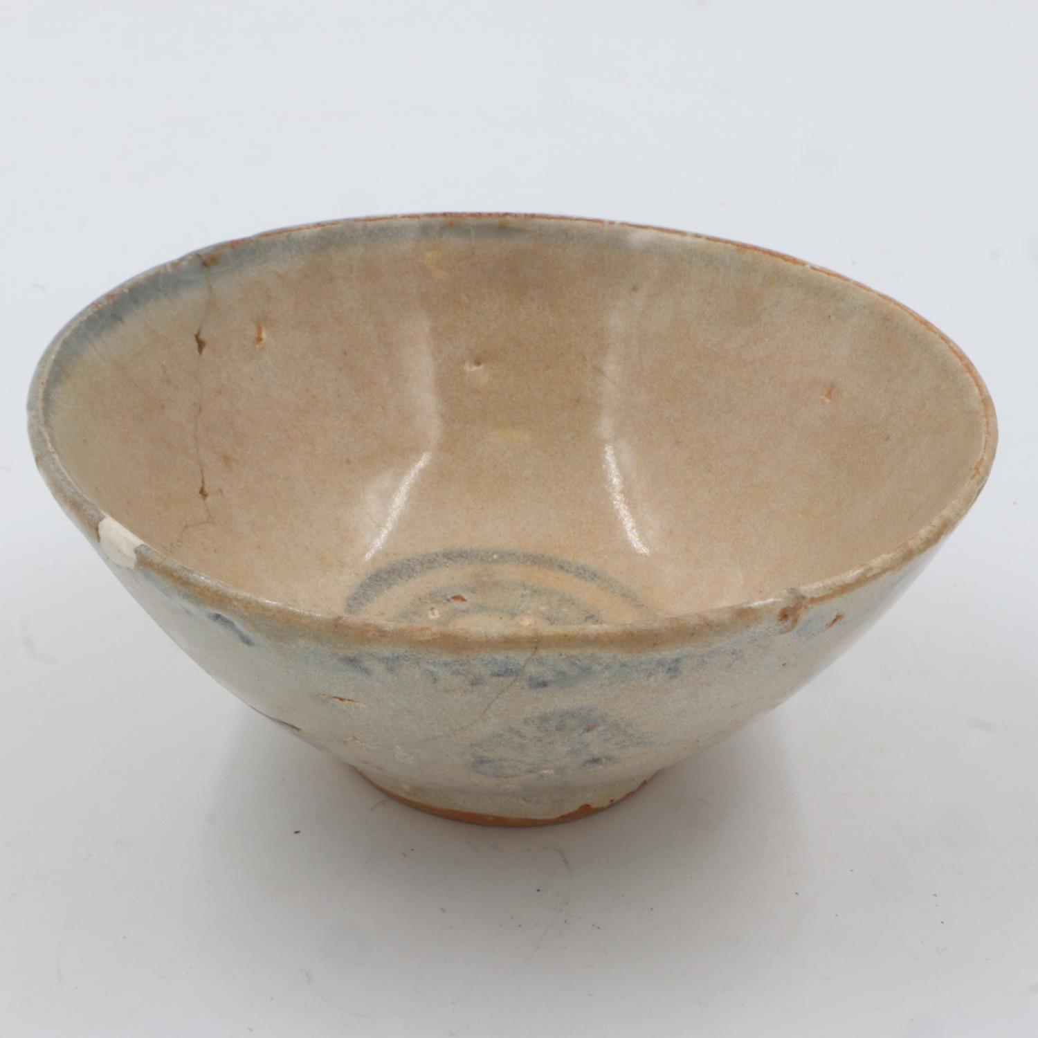 Early Ming dynasty glazed blue and white footed bowl, some cracks and repairs, D: 14 cm. UK P&P
