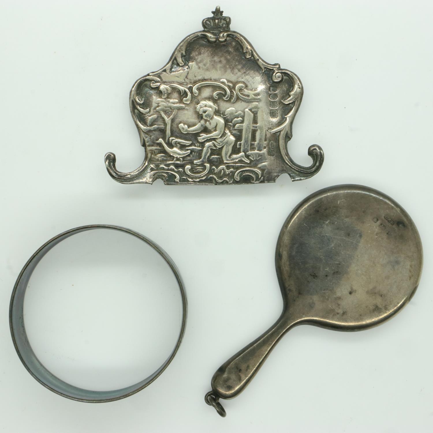 Mixed silver including a Georgian buckle, napkin ring and miniature hand mirror. UK P&P Group 1 (£