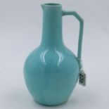 Christopher Dresser for Samuel Lear, an Aesthetic Movement art pottery jug, circa 1880, bulbous