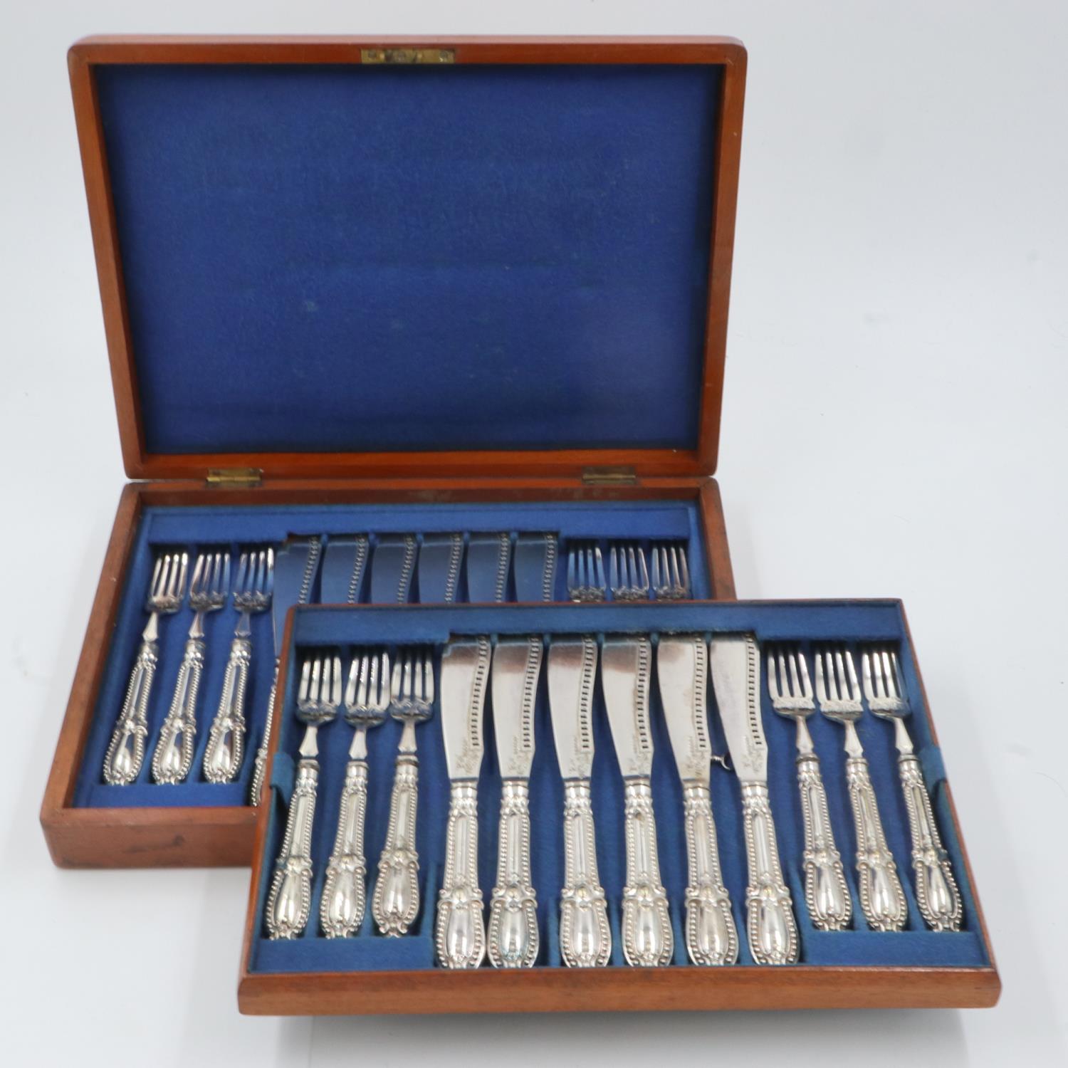 Walnut cased cutlery set of silver plated cutlery over two trays. UK P&P Group 2 (£20+VAT for the