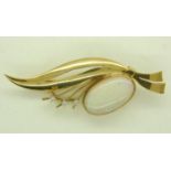 Continental gold brooch (unmarked), set with a large oval cabochon opal and three diamonds, L: 65