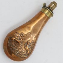 Brass relief decorated powder flask, L: 21 cm. UK P&P Group 2 (£20+VAT for the first lot and £4+