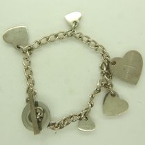Jasper Conran silver charm bracelet, L: 20 cm, 30g. UK P&P Group 0 (£6+VAT for the first lot and £