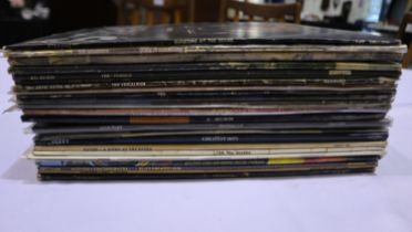 Box of mixed Rock vinyl LPS including Pink Floyd, Queen, The Beatles, Yes, E.L.O etc. UK P&P Group 3