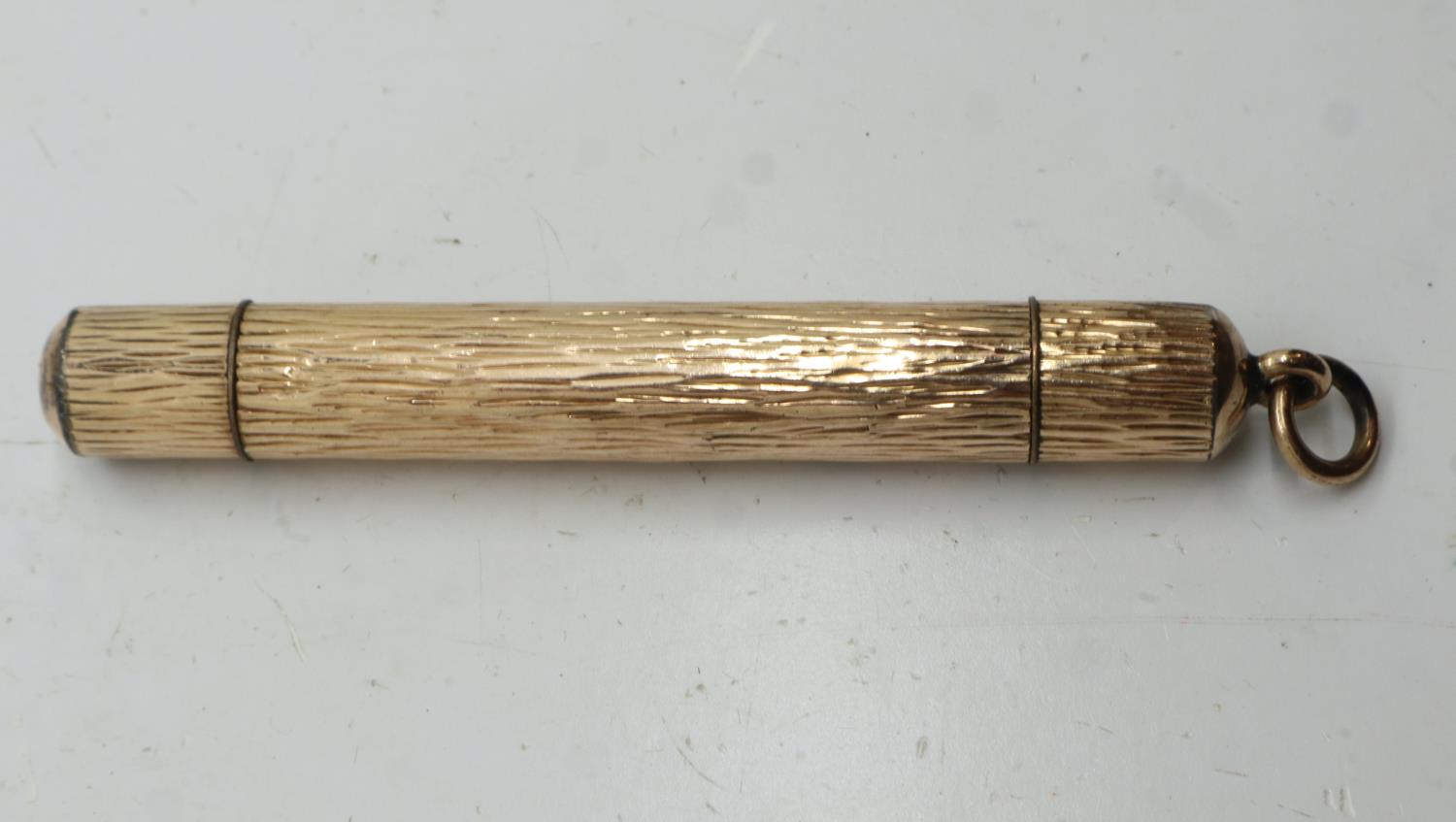 A yellow metal propelling pencil, bark-effect with jump-ring, extended L: 13 cm. UK P&P Group 1 (£ - Image 2 of 2