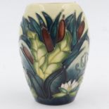 Sue Pointon for Moorcroft, a baluster floral vase, no chips or cracks, H: 14cm. UK P&P Group 1 (£