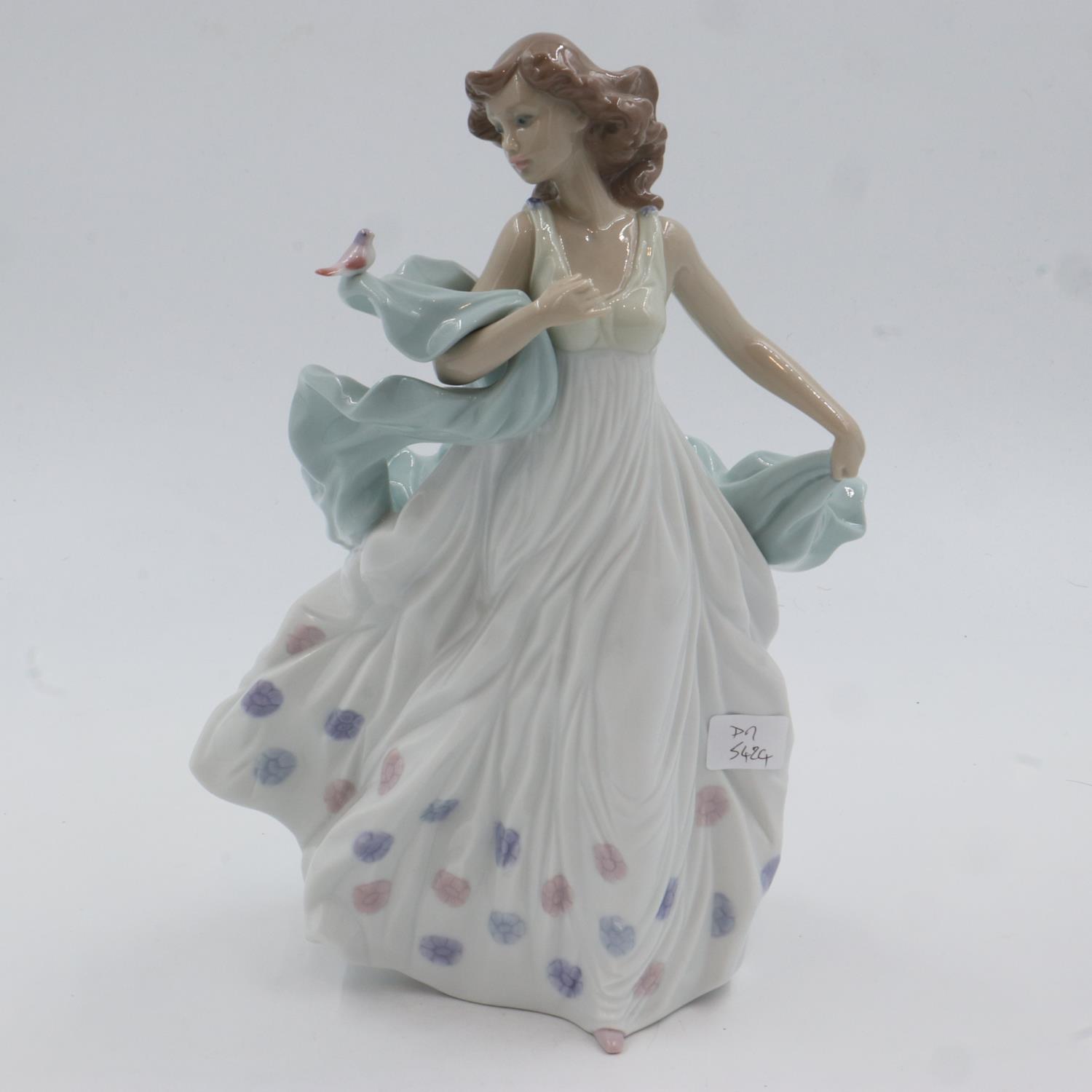 Lladro figurine with a bird, H: 30 cm, no cracks or chips. UK P&P Group 2 (£20+VAT for the first lot