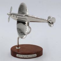 Chrome Spitfire on wooden base, L: 19 cm. UK P&P Group 2 (£20+VAT for the first lot and £4+VAT for