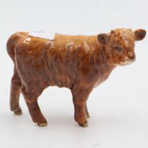 Beswick Highland calf, L: 16 cm. UK P&P Group 1 (£16+VAT for the first lot and £2+VAT for subsequent