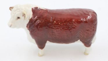 Beswick Hereford bull, damaged, L: 21 cm. UK P&P Group 2 (£20+VAT for the first lot and £4+VAT for