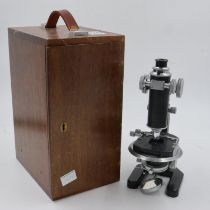 Baker of London microscope, cased with two eyepieces. UK P&P Group 3 (£30+VAT for the first lot