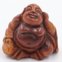 Carved wooden Buddha, H: 62 mm. UK P&P Group 1 (£16+VAT for the first lot and £2+VAT for