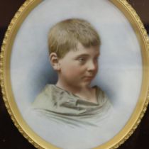 19th century KPM style oval porcelain plaque, portrait of a young boy, signature faded (Stuart