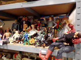 Shelf of mixed action figures and Lego sets. Not available for in-house P&P