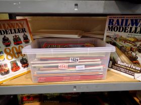 Three containers of model railways/military model magazines. Not available for in-house P&P