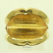 A wide profile 18ct gold ring, set with a large channel-set faceted citrine, size M, 10.7g. Small