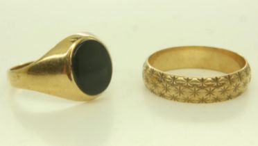 Two 9ct gold rings: decorated band ring size P, 2.9g and an onyx-set signet ring, shank mis-