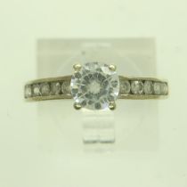 9ct white gold solitaire ring set with cubic zirconia and stone-set shoulders, size P/Q, 2.2g. UK
