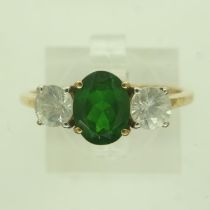 10ct gold white topaz and emerald set trilogy ring, size S, 2.8g. UK P&P Group 0 (£6+VAT for the