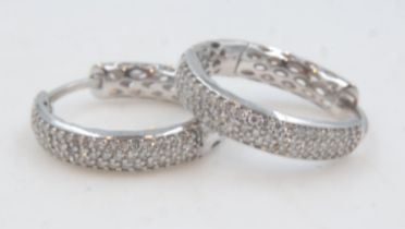 18ct white gold diamond set hoop earrings, 3.8g. UK P&P Group 0 (£6+VAT for the first lot and £1+VAT