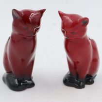 Two Royal Doulton flambé seated cats, largest H: 13 cm. UK P&P Group 2 (£20+VAT for the first lot