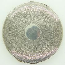 A hallmarked silver circular powder compact, Birmingham assay, 71g. UK P&P Group 1 (£16+VAT for