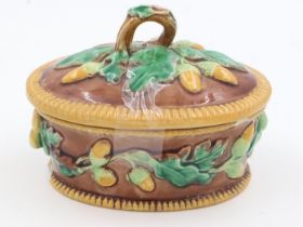 Oval Victorian Majolica lidded dish, L: 16 cm. UK P&P Group 2 (£20+VAT for the first lot and £4+