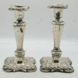 Pair of hallmarked silver candlesticks in the Regency manner, each H: 13 cm, Birmingham assay,