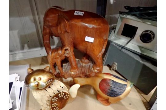 Large carved wooden elephant figure, with a wooden goose figure and a metal cat, largest H: 38 cm (