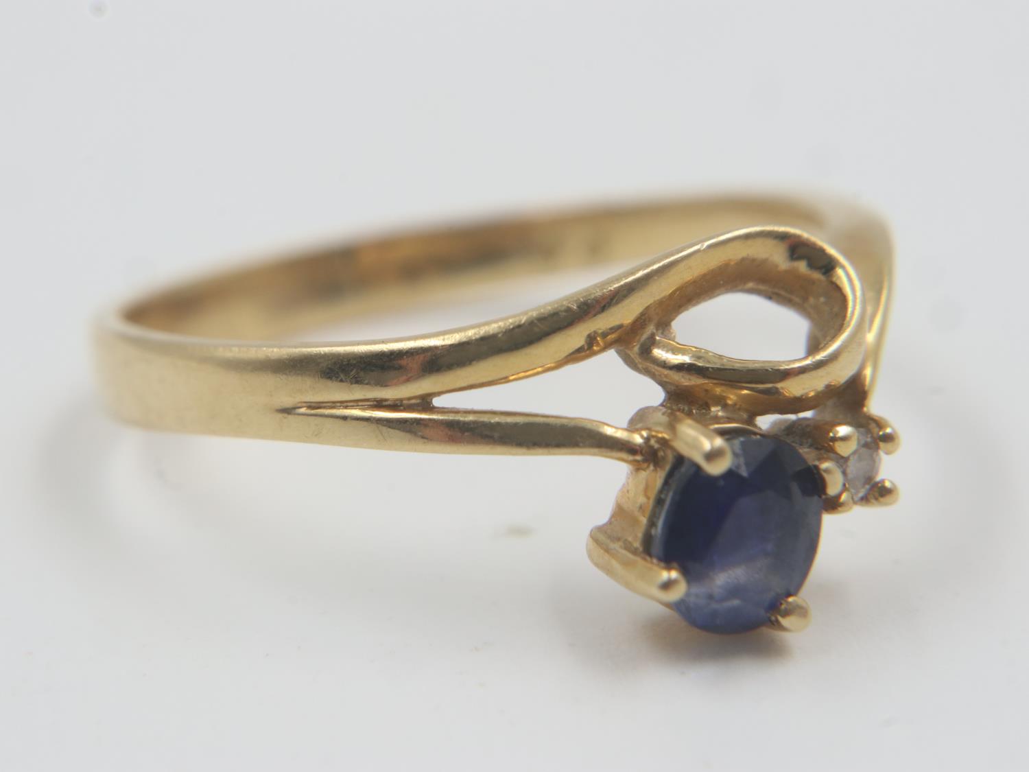 Contemporary 18ct gold sapphire and diamond set ring, size L/M, 2.4g. UK P&P Group 0 (£6+VAT for the