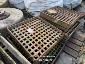 TEN CAST IRON MANHOLE COVERS, 63CM (W) X 60CM (L) X 9CM (D)