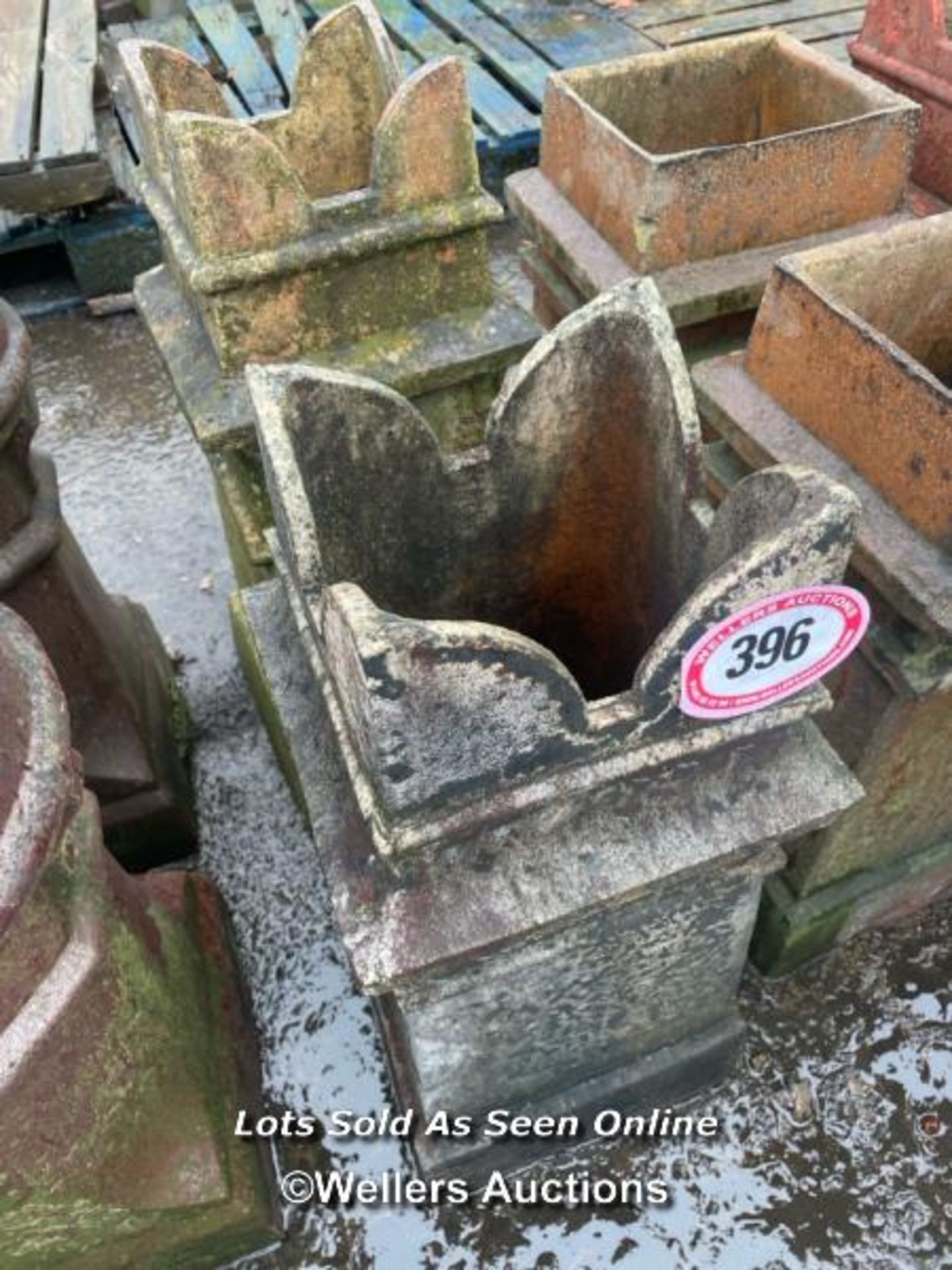 A PAIR OF CASTLE CHIMNEY POTS, 70CM (H)