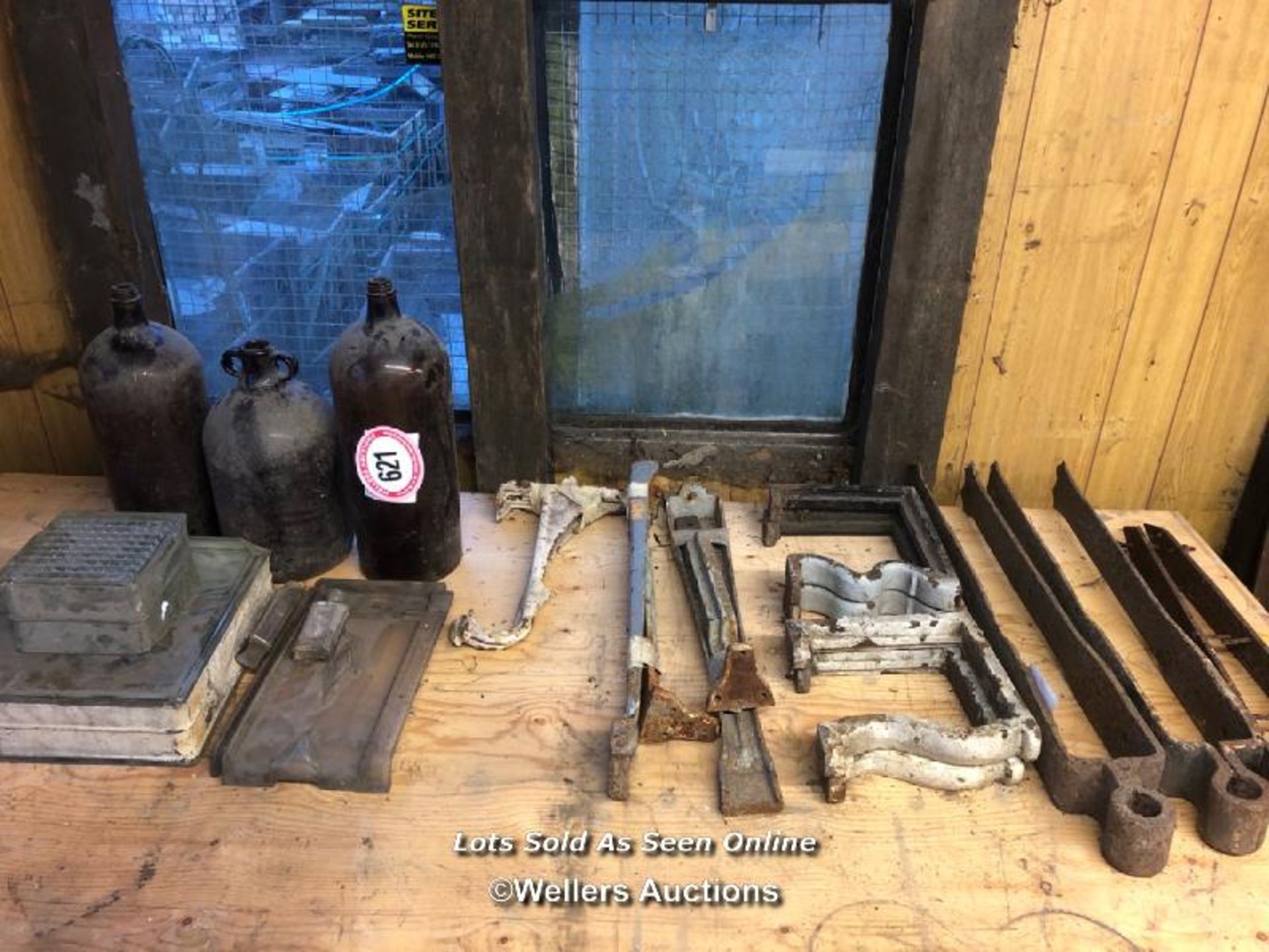 JOB LOT OF CAST IRON AND VINTAGE BOTTLES
