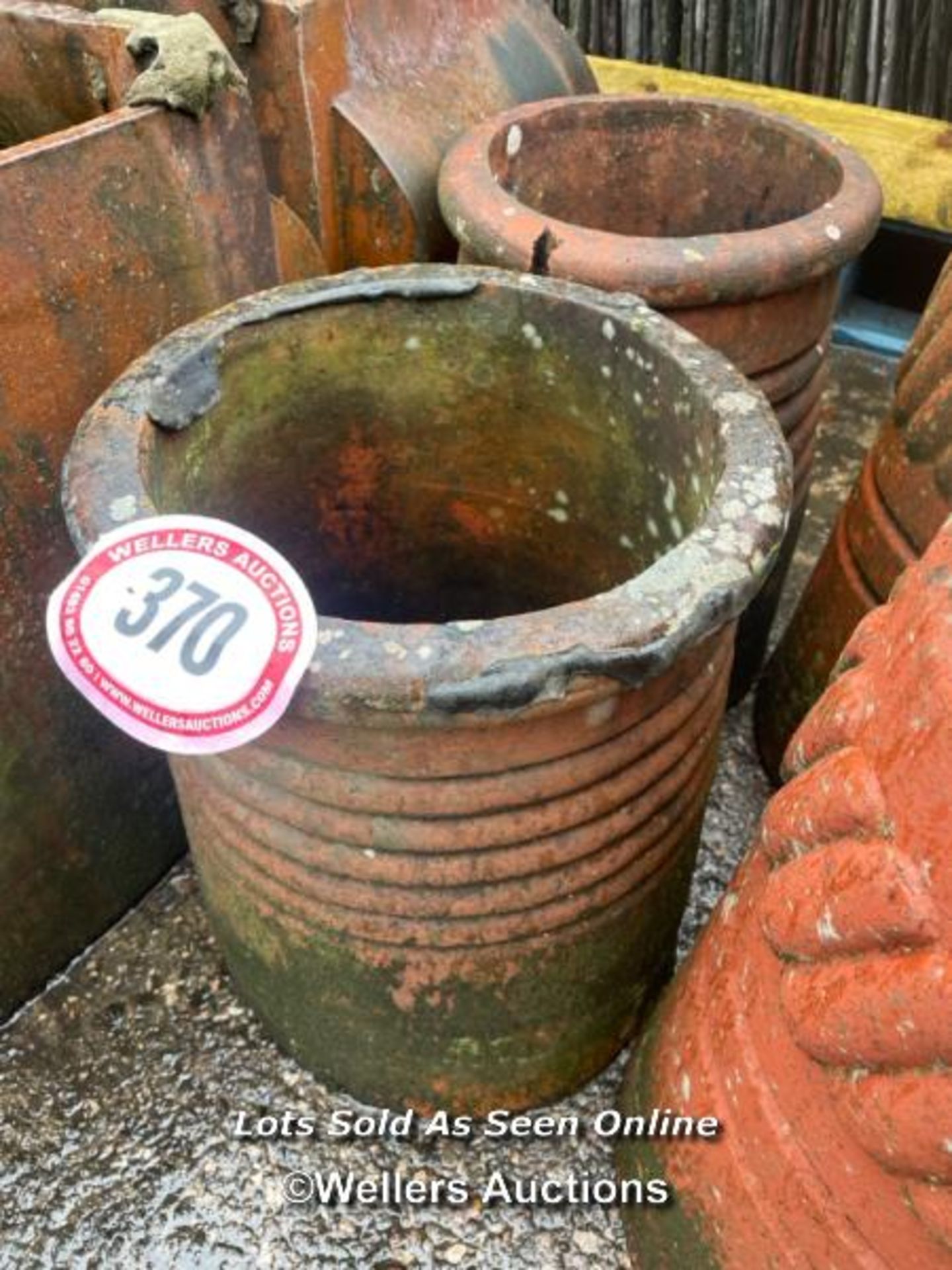 A PAIR OF TERRACOTTA BEEHIVE CHIMNEY POTS, 40CM (H)