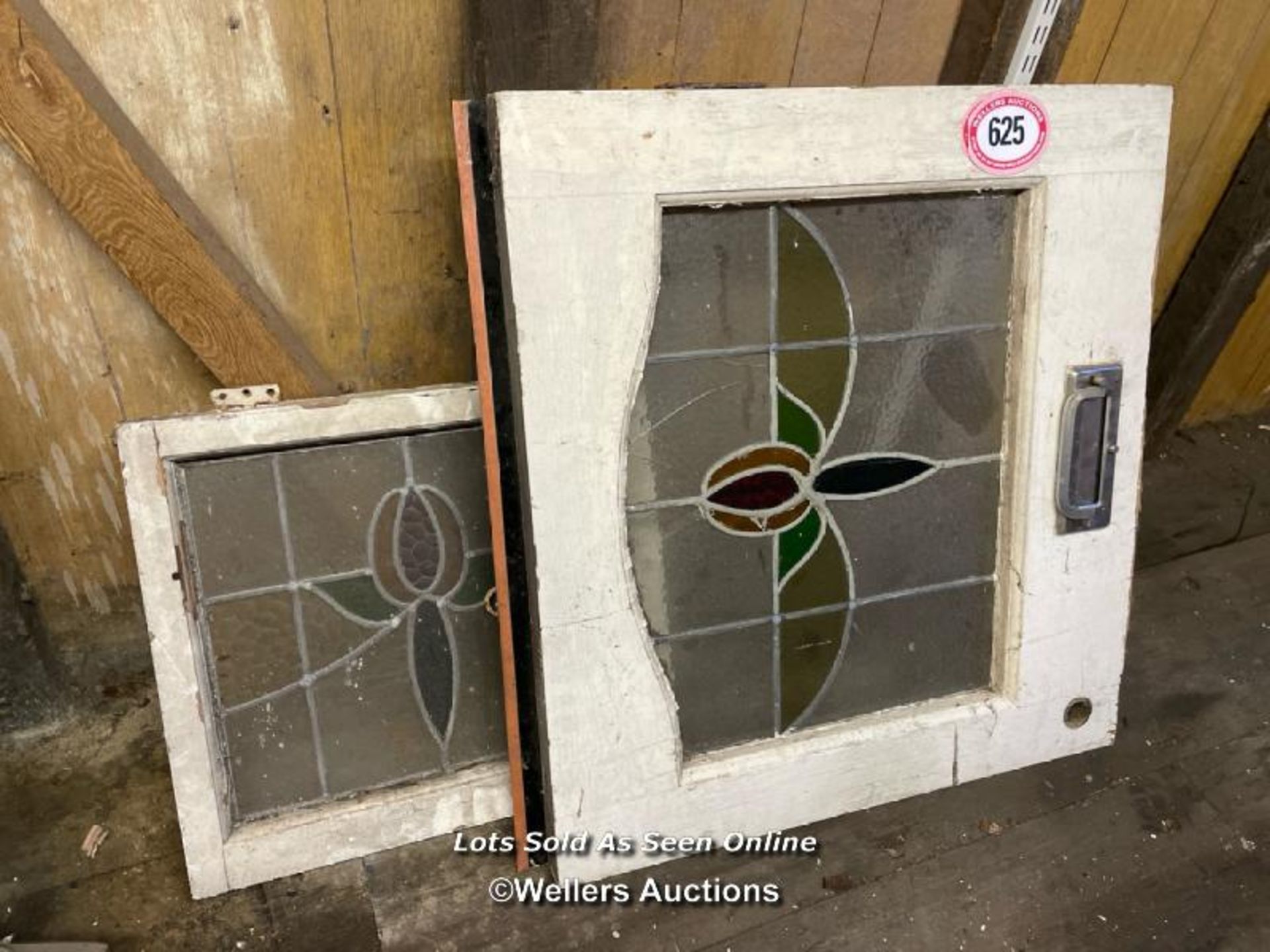 ONE STAINED GLASS WINDOWS AND ONE PART FRONT DOOR, STILL WITH ORIGINAL LETTERBOX INSERT, 75.5CM (