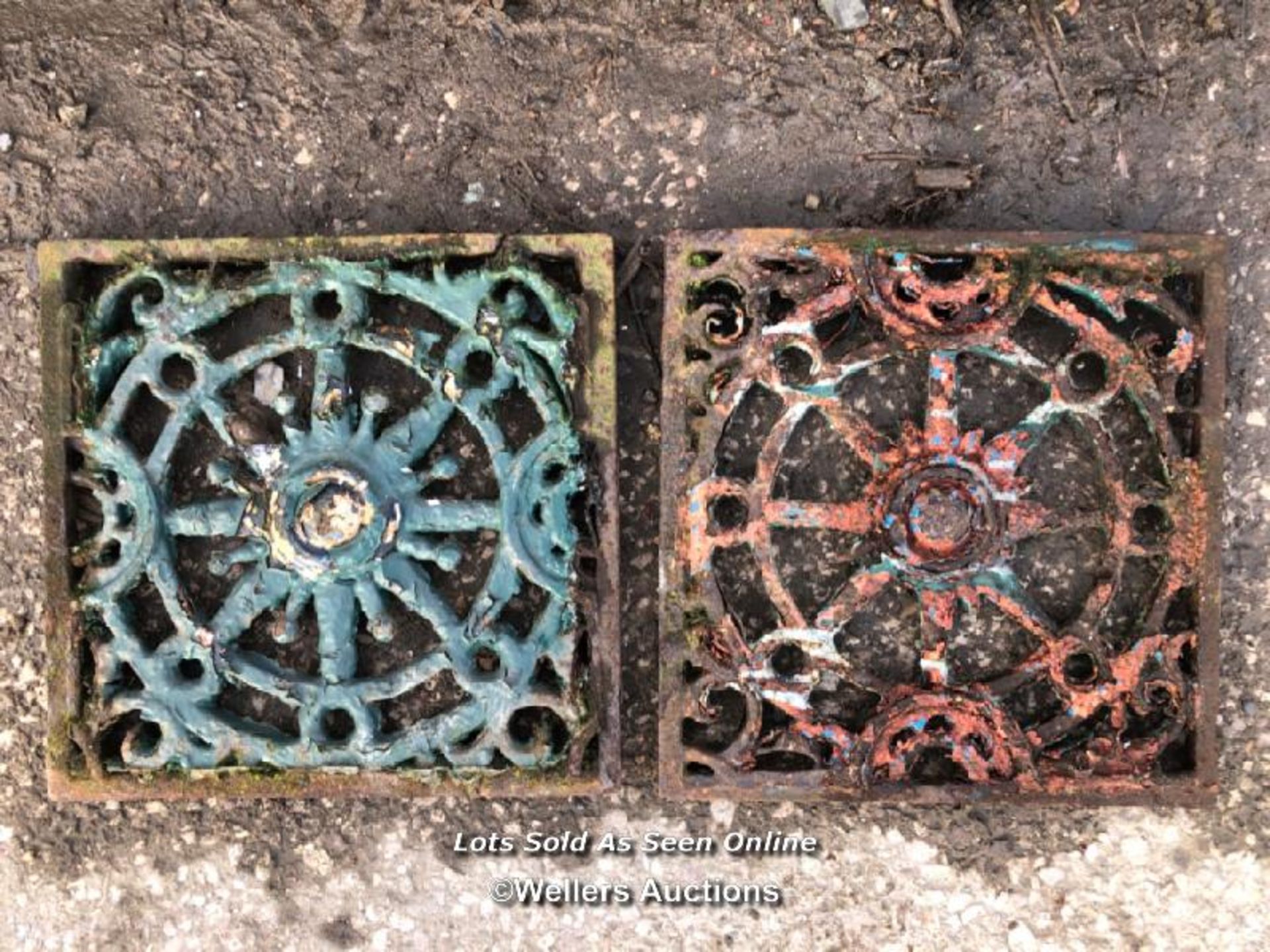 A PAIR OF MATCHING CAST IRON FEATURES, APPROX. 30CM (W) X 30CM (W)