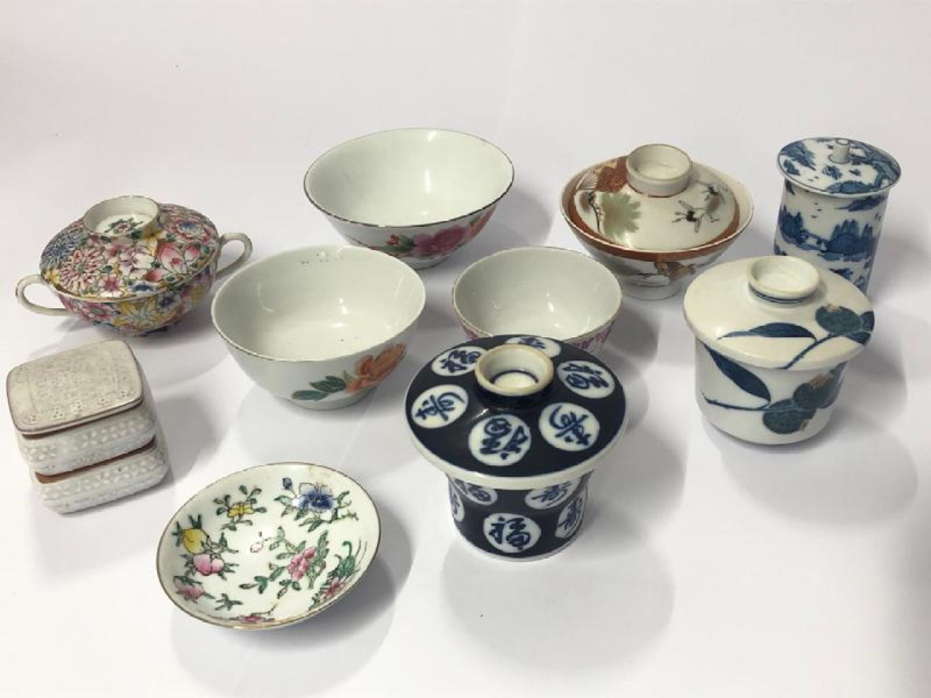 Collection of vintage oriental ceramics including Japanese tea cups with lids, small Chinese