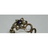 Amethyst and split pearl cluster ring in 9ct hallmarked gold, with pierced shoulder decoration. Ring