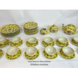 Vintage Chinese fourty five piece tea service, hand painted yellow with flowers / AN13