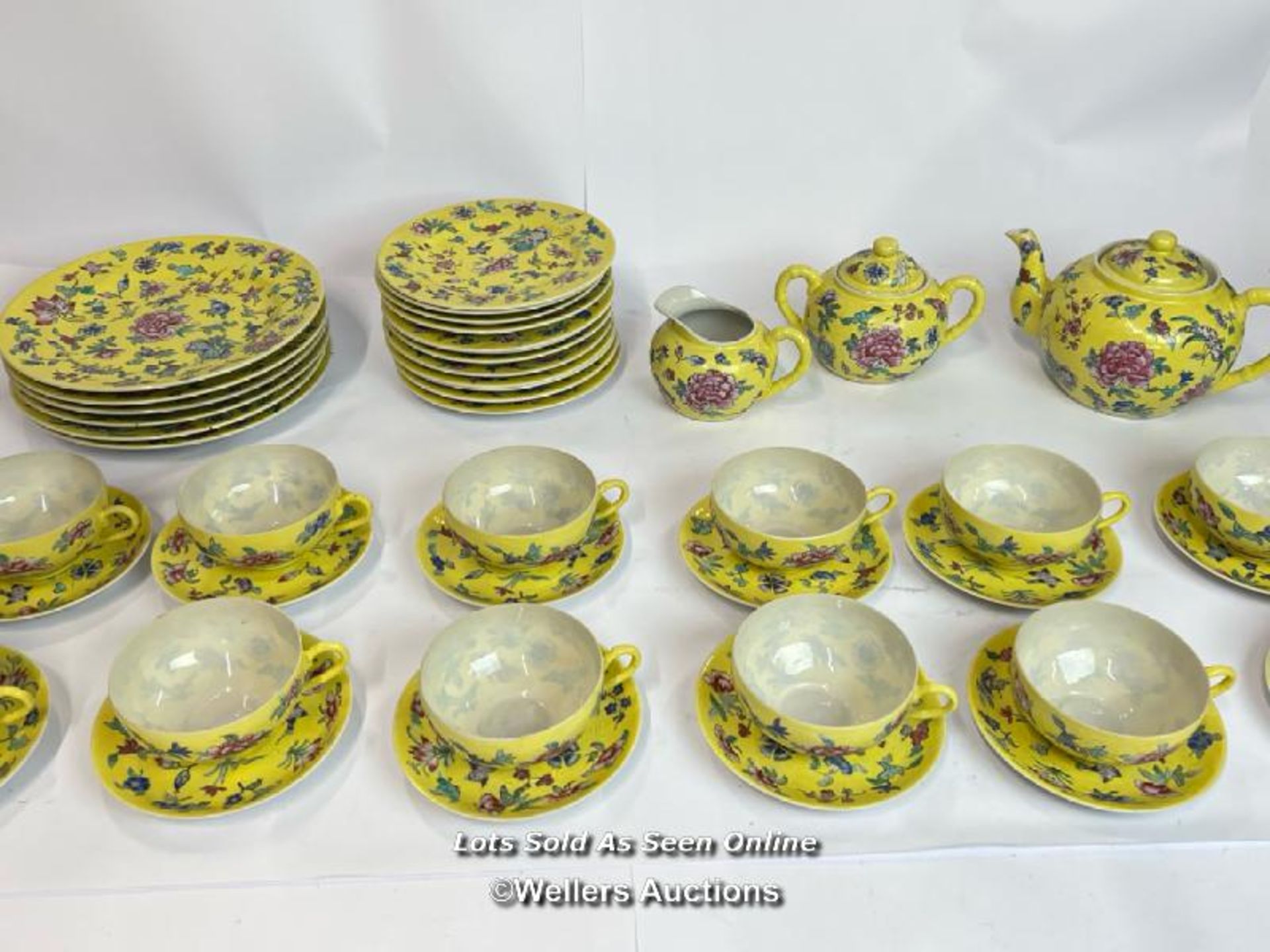 Vintage Chinese fourty five piece tea service, hand painted yellow with flowers / AN13