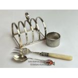 A collection of sterling silver including toast rack, napkin ring, silver & mother of pearl bread