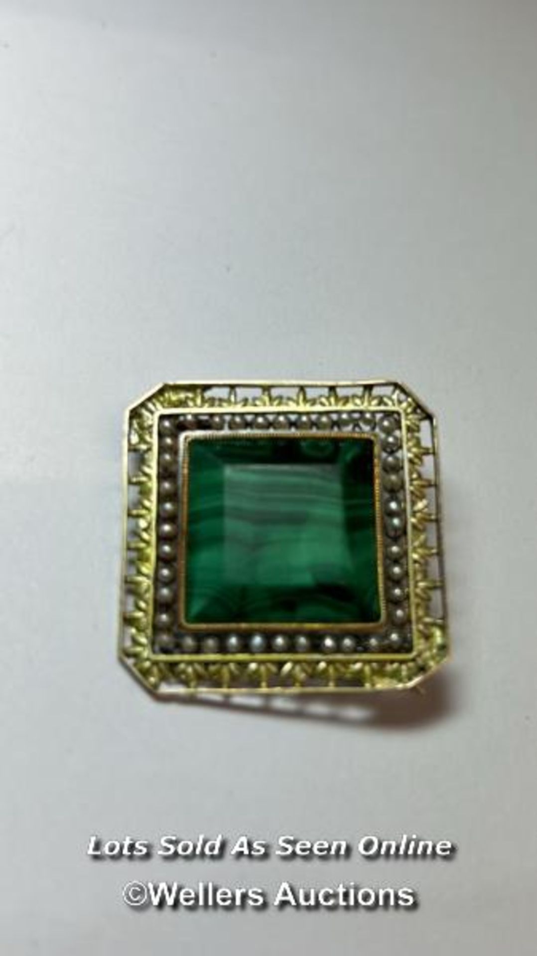 An antique brooch in yellow metal testing as 18ct gold, with centre set with malachite bordered by - Image 2 of 3