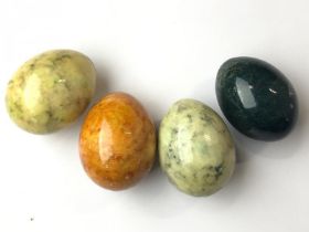 *Four Italian carved marble eggs (lot subject to VAT) /AN2