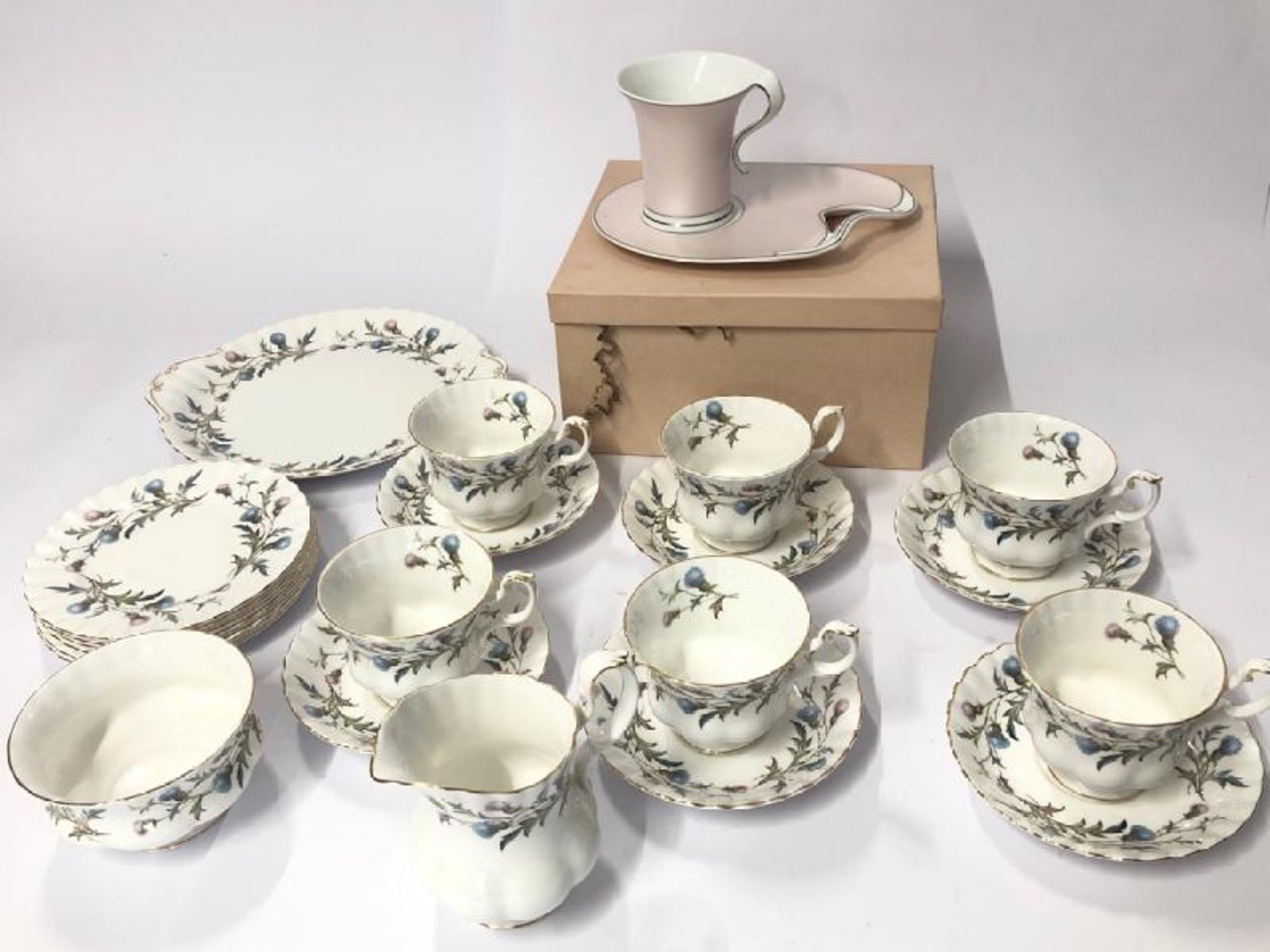 A boxed Leonardo Collection cup and saucer set with a part Royal Albert " Brigadoon" tea set