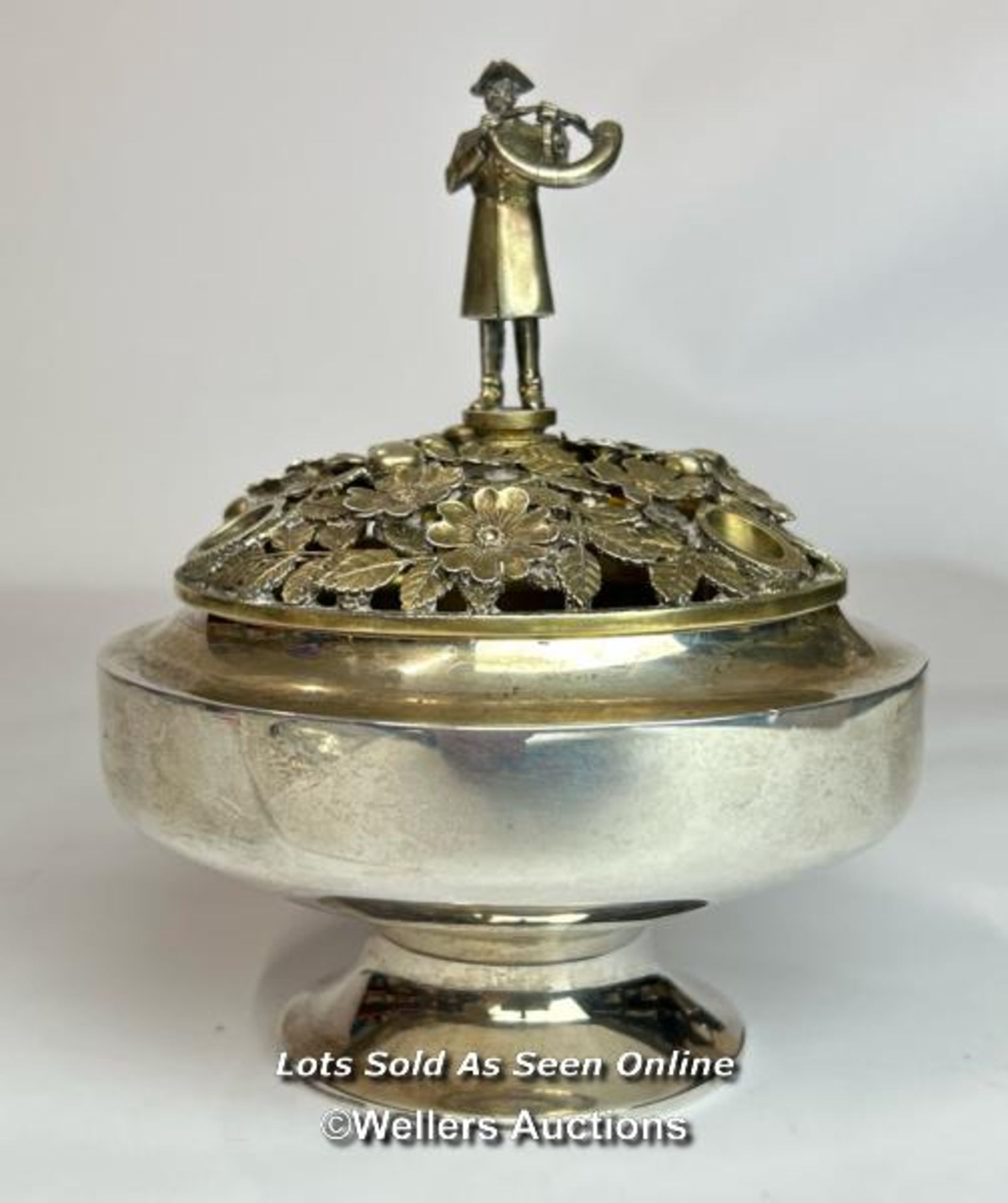 A silver & silver gilt "Ripon" centrepiece by Hector Miller, the pierced foliate top surmounted by a