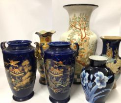 Six assorted vases including a large floor vase decorated with peacocks, 55cm high and a pair of